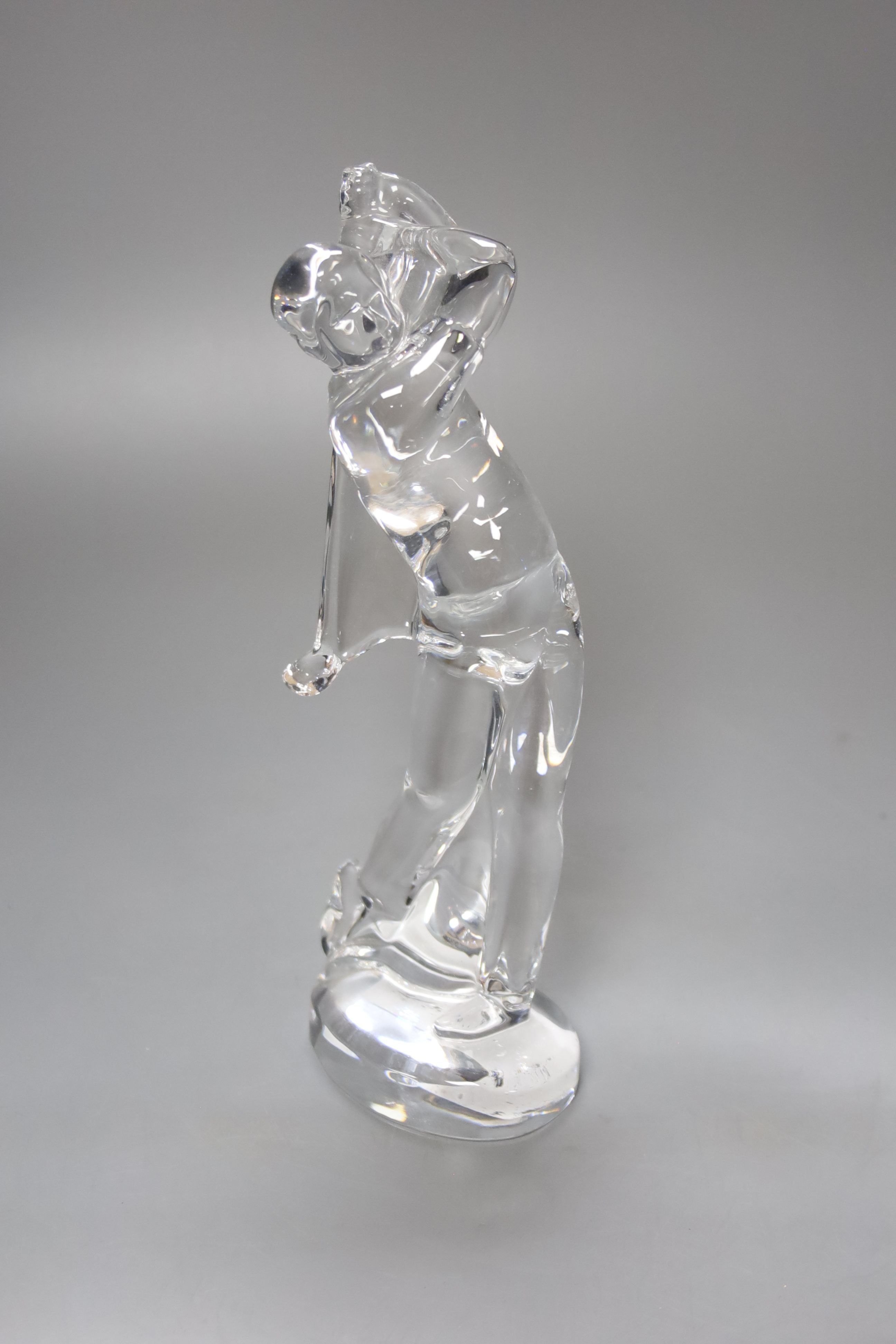 A boxed Baccarat crystal figure of a golfer, 23cm high